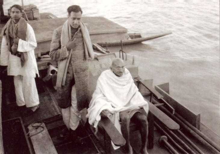 Sudhir Ghosh (left), Ramkrishna Bajaj (centre) and Mahatma Gandhi on a boat on way to Midnapur (East Bengal), December 24, 1945.