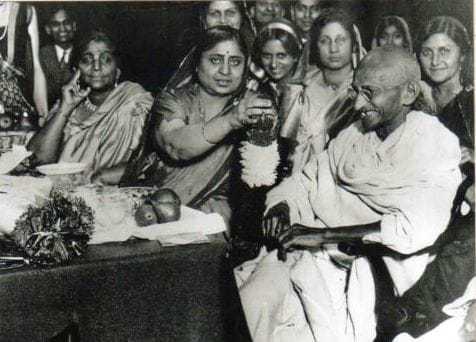 Mahatma Gandhi with women. Sarojini Naidu is on the left. Before 1942.