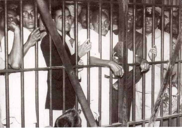 Gandhi is being seen off at the jail gate of Dum Dum Jail, Calcutta, by some of the security prisoners and jail officials. January 17, 1946.