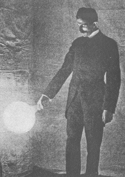 Some experiments in Tesla's laboratory with currents of high potential and high frequency. Lighting a disconnected vacuum bulb of 1,500 C.P. by high-frequency currents - photograph taken by the light of the bulb itself, exposure about two seconds.