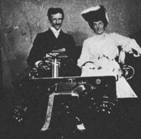 Tesla with an unidentified woman.