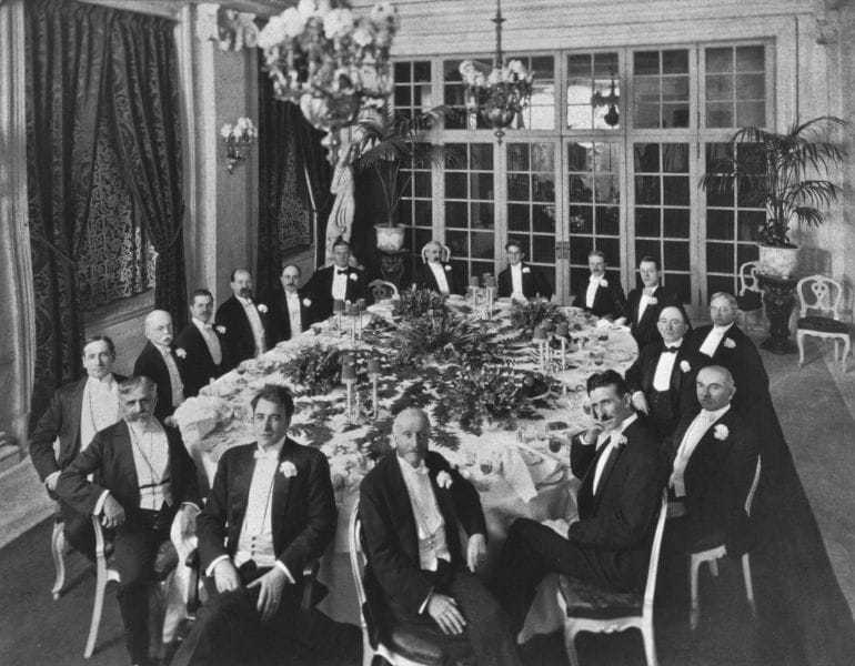 A 1910 banquet honoring Mr. Henry Clews, newly elected as president of the American Civic Alliance, with the Board of Governors. Tesla is second from the right.