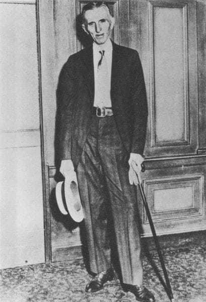 Tesla in his hotel room in the late 1930's. After his accident, he walked with a cane.