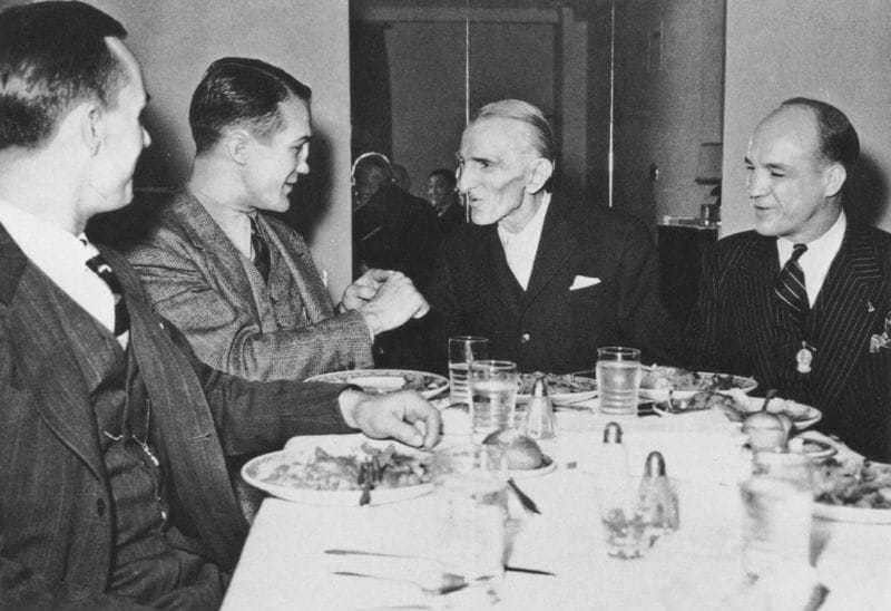 Tesla meets King Peter II of Yugoslavia on July 15, 1942. Tesla's nephew, Sava Kosanović, is third from the left.