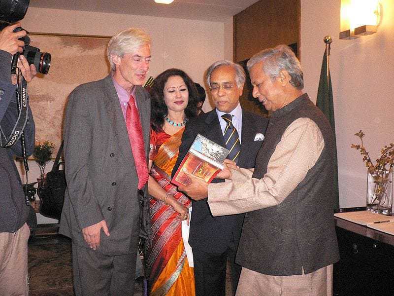 Laurence Brahm with Muhammad Yunus.