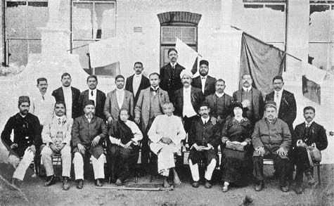 The last photograph of Kasturba and Mahatma Gandhi in Durban, South Africa along with several friends before their return to India, July 1913.