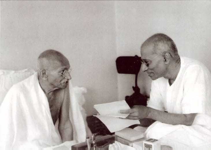 Mahatma Gandhi speaking to co worker Chakraborty Rajagopalachari Mumbai Bombay Maharashtra. India. September 1944.