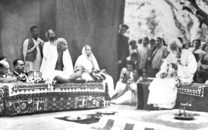 Poet Rabindranath Tagore delivering an address of welcome to Mahatma Gandhi and his wife Kasturba, February, 1940.