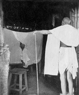 Gandhi visits Parchure Shastri, a teacher and fellow ashramite. Segaon. December 1939.