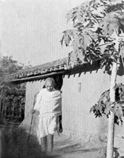 Gandhi in front of his hut at Segaon. January 1940.