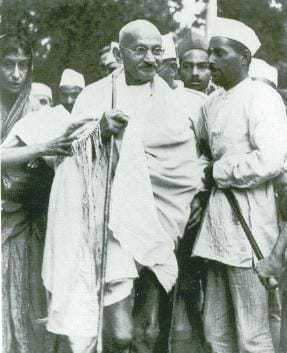Gandhi walking to meet Viceroy Lord Linlithgow in Simla, with Rajkumari Amrit Kaur behind him, September 12, 1939.