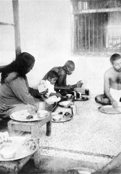 Swami Paramhansa Yogananda and Gandhi taking their meals at Satyagraha Ashram, Sevagram, August 26, 1935.