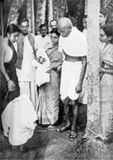 Gandhi giving solace to the sufferers of Noakhali. December 1946.