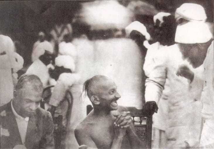 Gandhi at a party given by Srinivas Iyengar, Madras, September 1921.