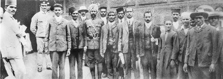 Gandhi outside the prison with fellow non-violent resisters in South Africa in 1908