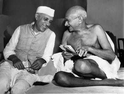 Jawaharlal Nehru sharing a joke with Mahatma Gandhi, Mumbai. July 6, 1946.