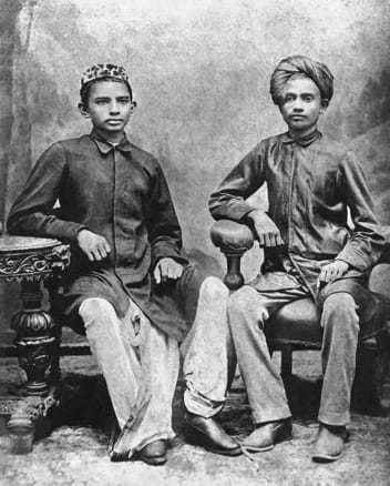 Mahatma Gandhi with his class mate Sheikh Mehtab (right) at Rajkot, 1883. Date, 1883.