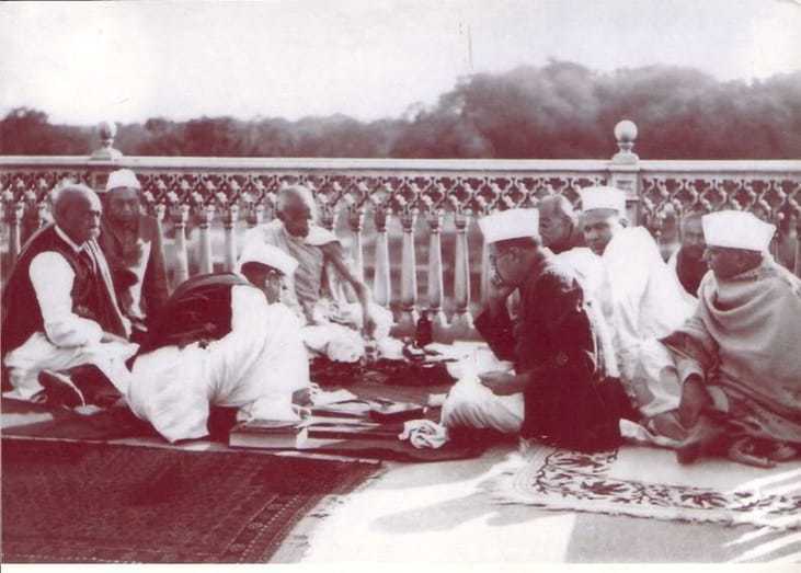 Gandhi taking a meal during his convalescence, June 1933.